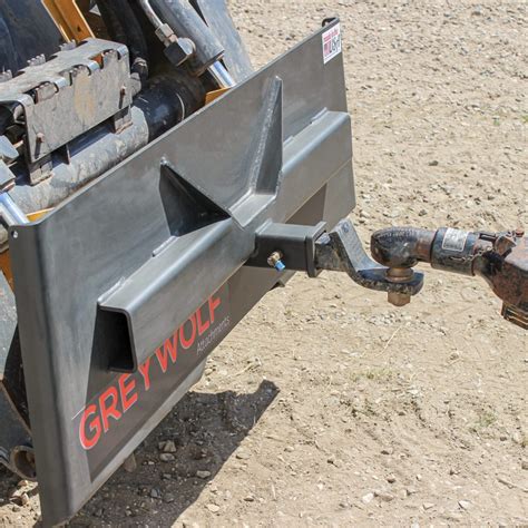 load skid steer on trailer|skid steer trailer hitch attachment.